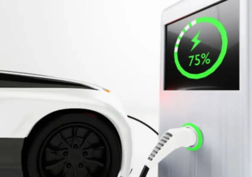 A white electric vehicle being charged via a charging gun, the charging pile screen shows the current battery level reaches 75%.